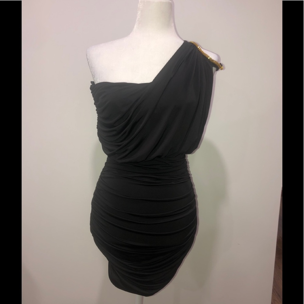 Black cocktail dress with gold detail